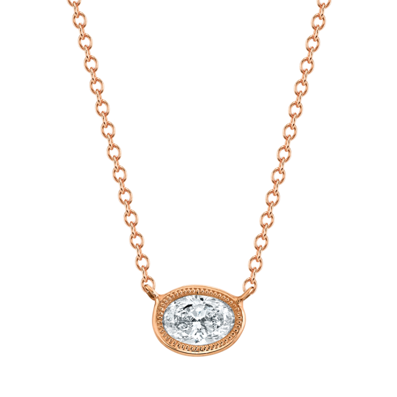 Petite Oval Cut Diamond Yellow Gold Bezel Pendant